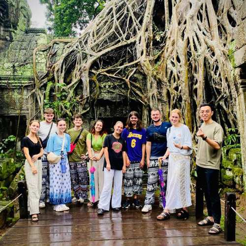 Small group tour at Ta Prohm temple on 2-Day Angkor Wat Temple Sunset & Floating Village Tour by siemreapshuttle.com