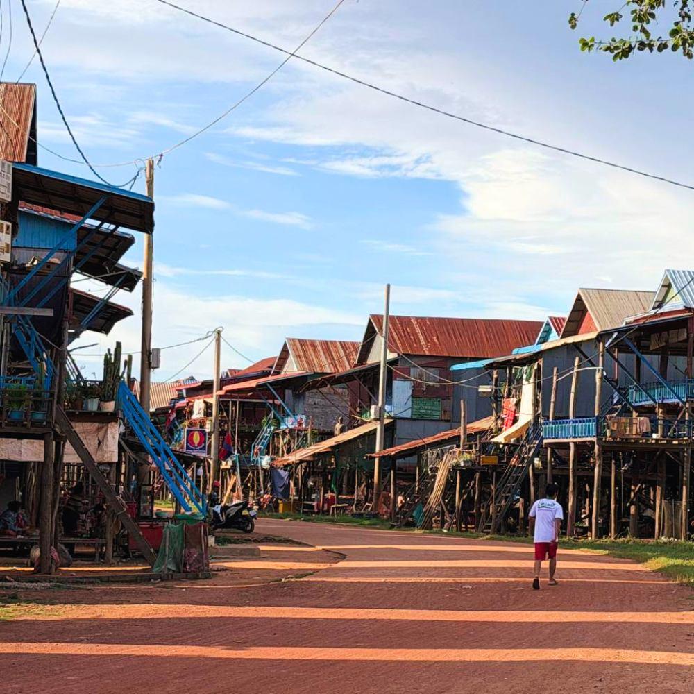 2 days in Siem Reap day 2 visit to Kompong Phluk with a village pagoda and tall stilt houses that show daily life near Tonle Sap