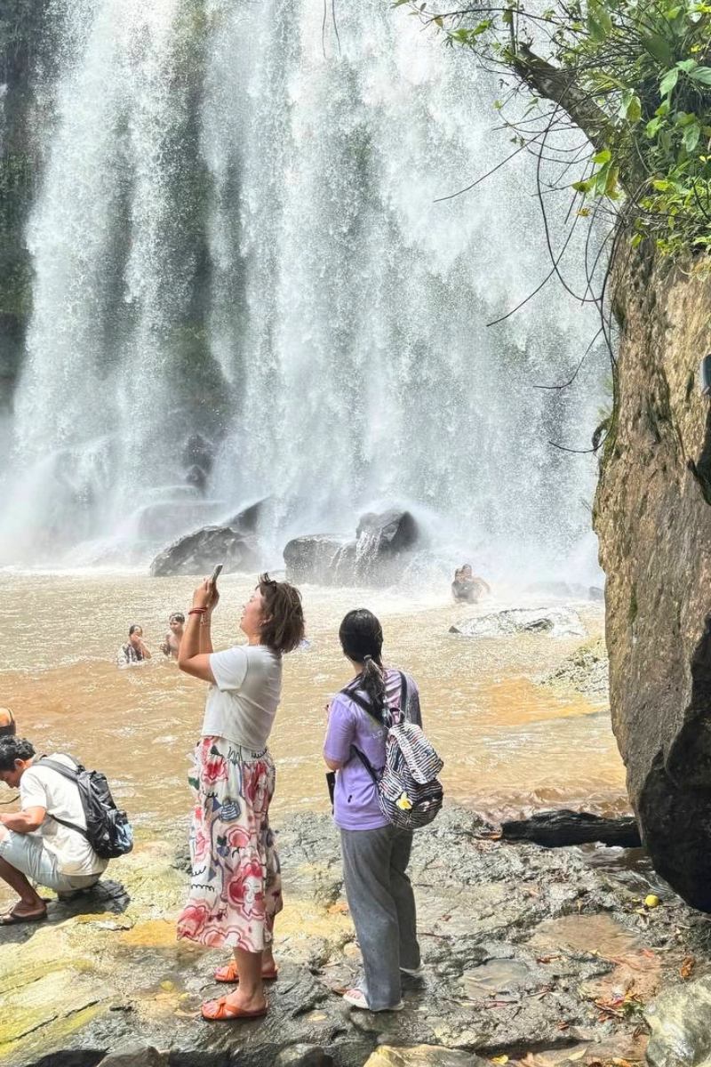 Kulen Mountain and Kampong Pluk Floating Village group tour at the waterfalls