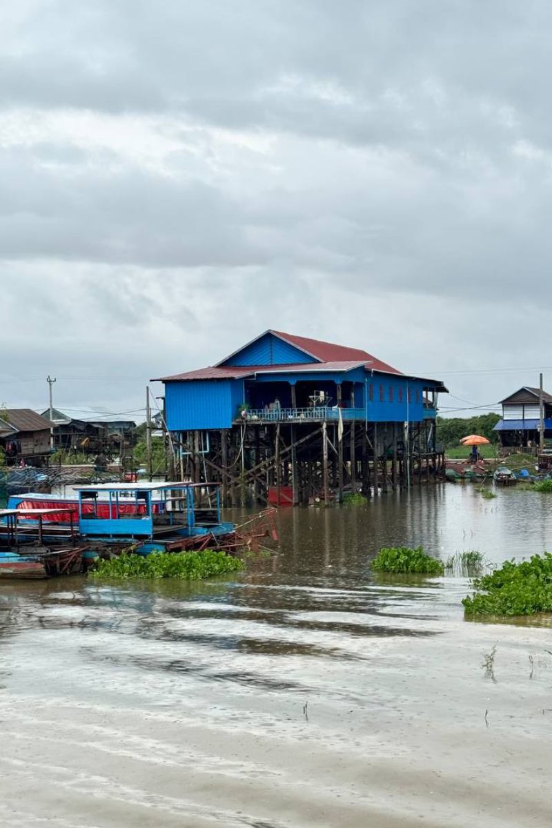 Longboat ride through the flooded forest on the Private Driver Service to Bakong and Rolous Temples with Kampong Phluk Floating Village