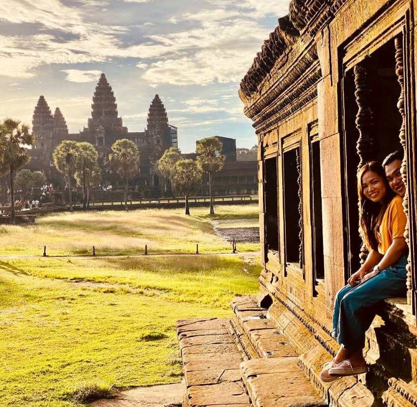 Angkor Wat Sunrise with couple shot at the library on 2-day Angkor Sunrise tour by siemreapshuttle.com