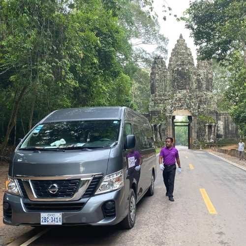 Explore Angkor with Bayon Temple and the world-famous Ta Prohm (Tomb Raider) Temple photo gallery - A view of the driver and the V.I.P. minivan.