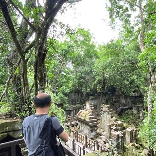 Posing-on-a-Koh-Ker-and-Beng-Mealea-Tour-with-Siem-Reap-Shuttle-tours-crew 5